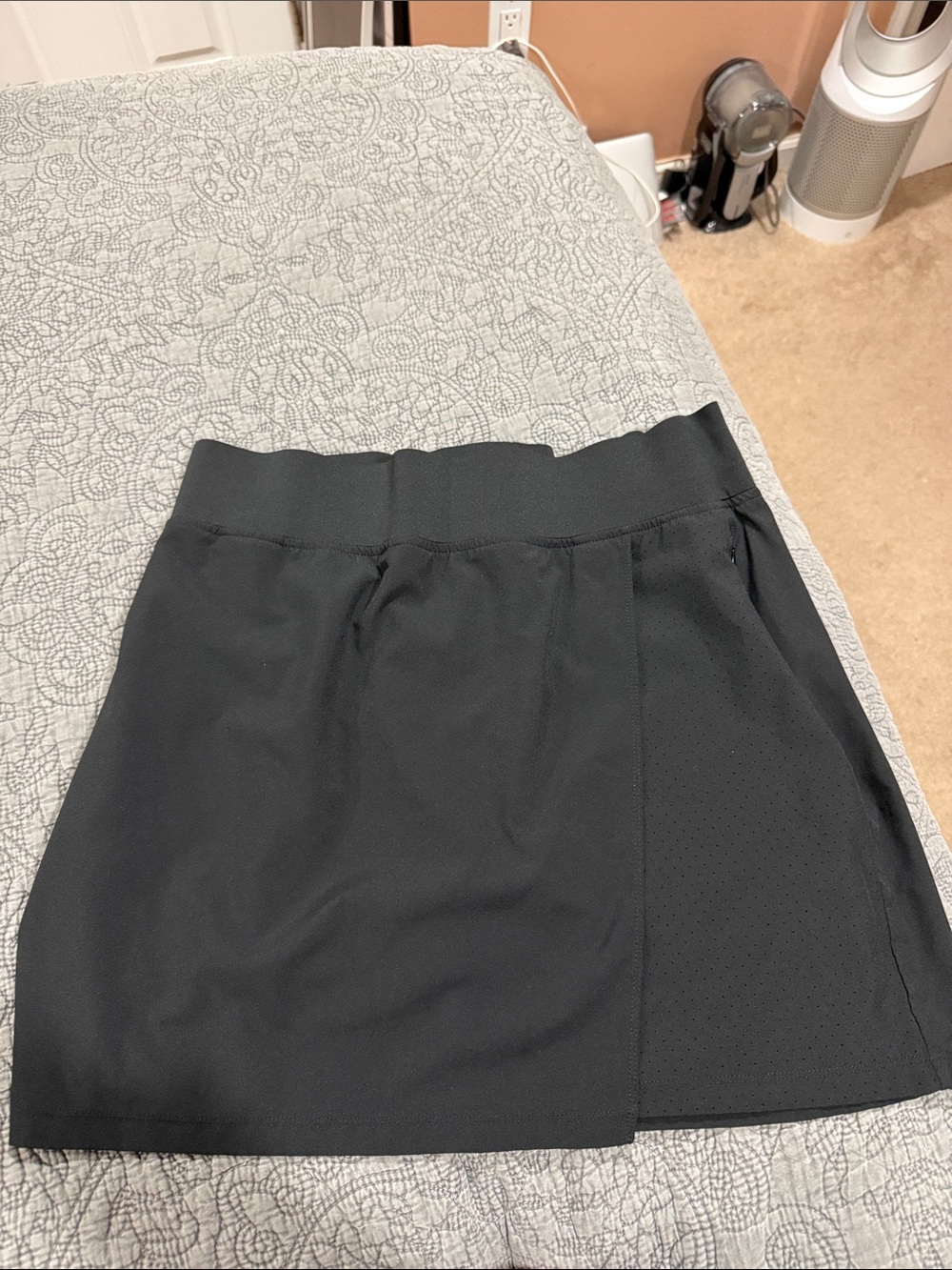 ZeroXposur Black Active Skort with Perforated Side Panel and zippered pocket